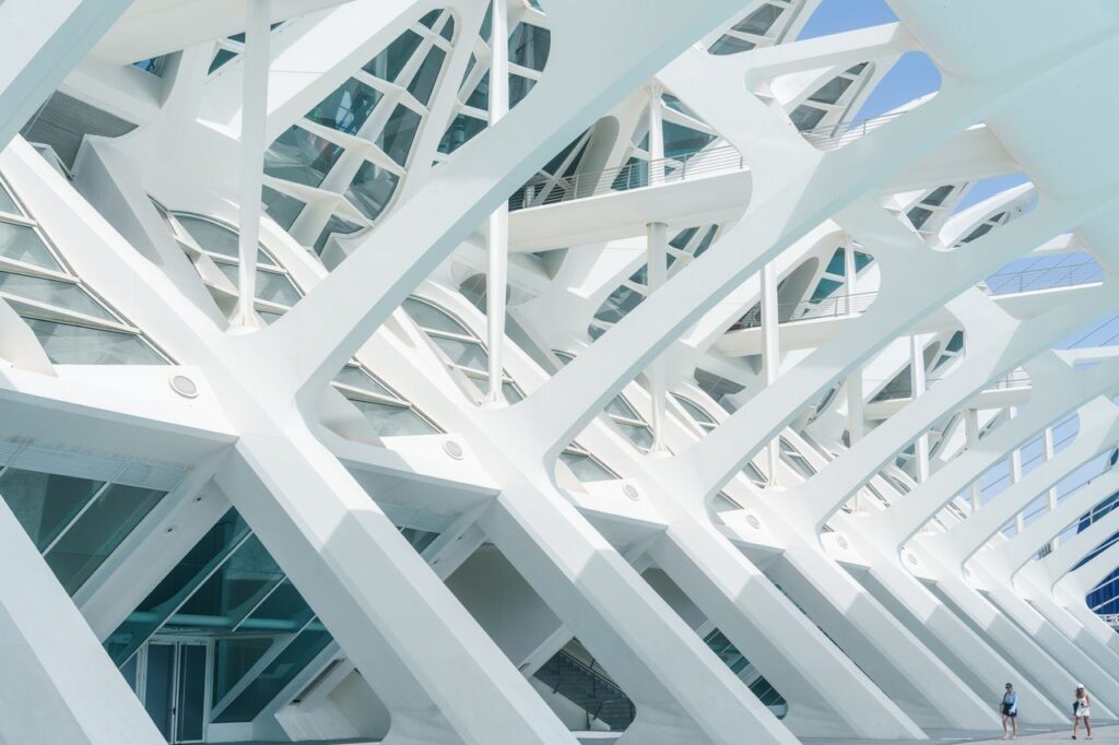 Elegant white geometric structure in modern architectural design, capturing light and shadow.
